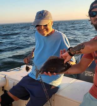 Casting Fluke into the Jersey shore.